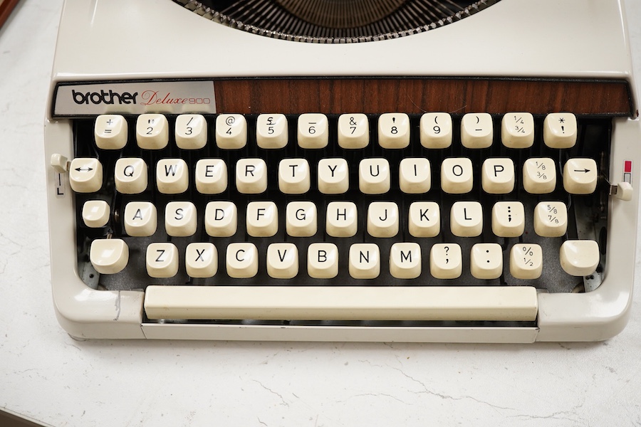 A 1970’s Brother Deluxe 900 working portable typewriter, 30cm x 30cm